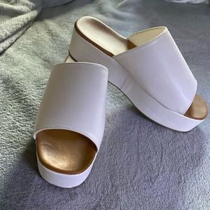 Women’s white sandals.